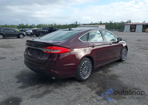 2017 Ford Fusion Hybrid Platinum z USA, uszkodzony, nr VIN 3FA6P0RU0HR309626